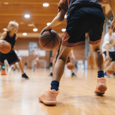 body-image-young-kids-in-gymnasium-playing-basketball